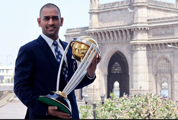 Dhoni Posing with 2011 World Cup Trohy
